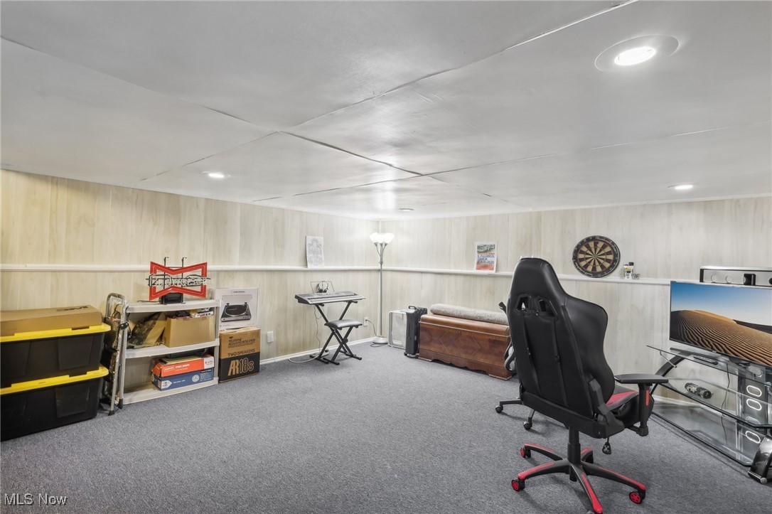1567 Roselawn Road Cleveland, OH 44124 - Photo 25 of 29 Office space featuring wood walls and carpet floors