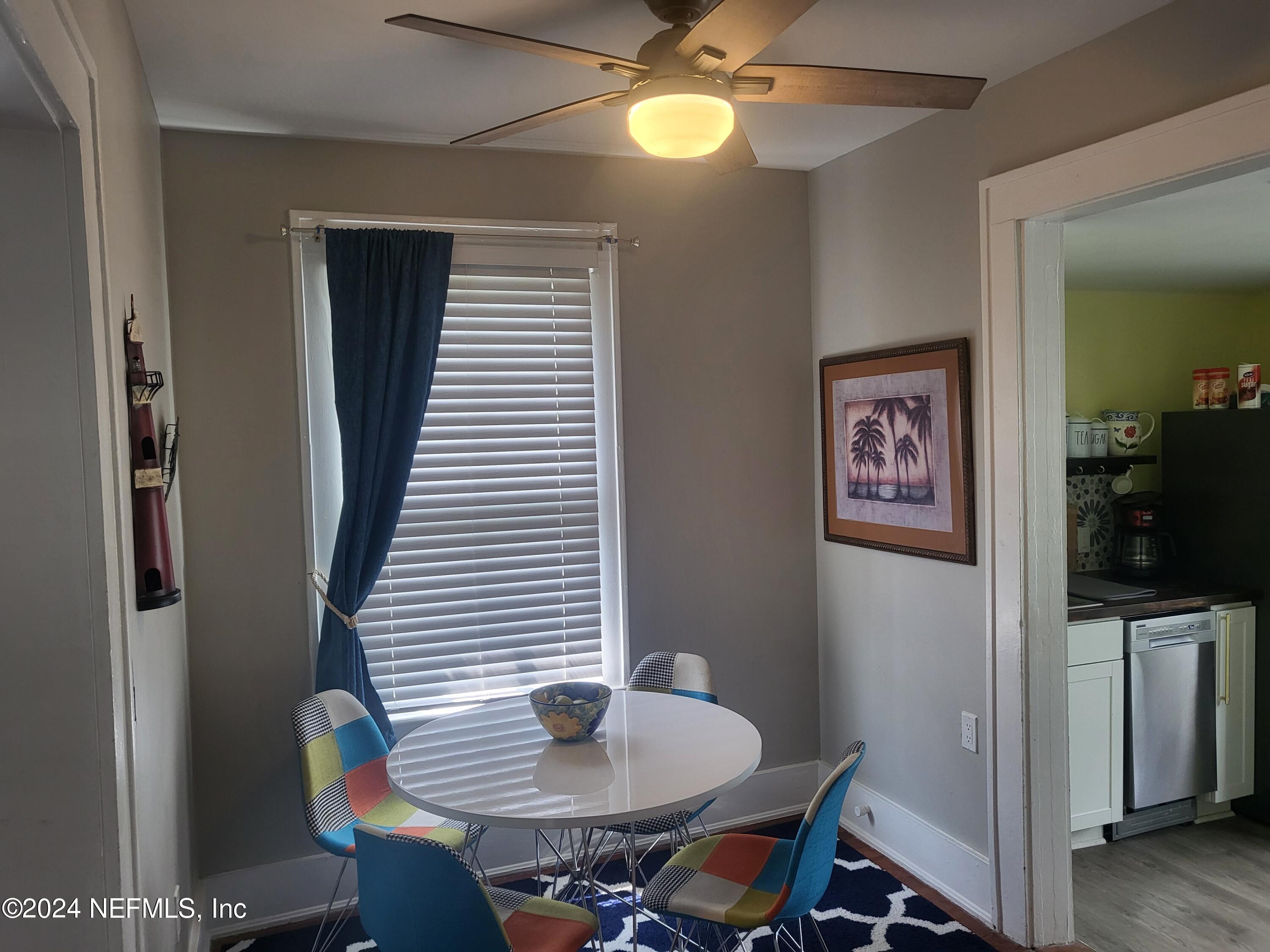 16 Rohde Avenue St. Augustine, FL 32084 - Photo 19 of 114 a view of a dining room with furniture and chandelier
