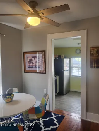 a kitchen with stainless steel appliances granite countertop a sink stove and microwave