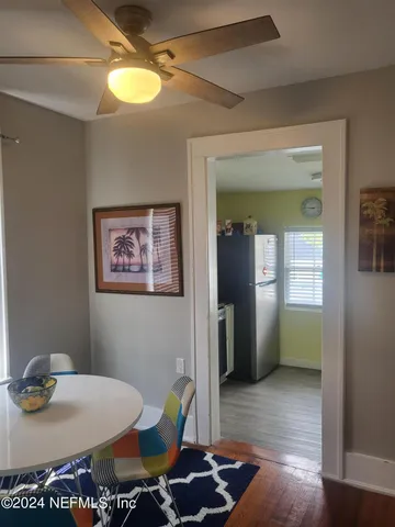 a kitchen with stainless steel appliances granite countertop a sink stove and microwave