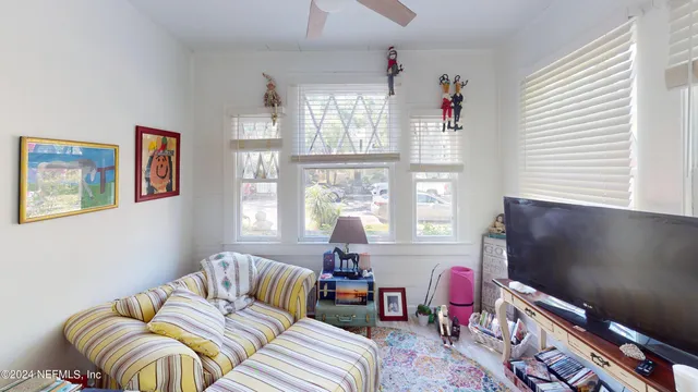 a room with furniture and a window