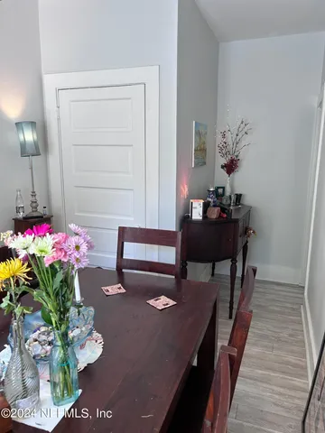 a kitchen with stainless steel appliances granite countertop a sink a stove and a microwave