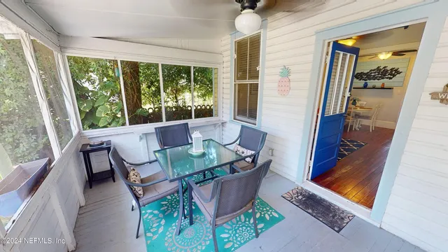 a bathroom with a sink mirror and vanity