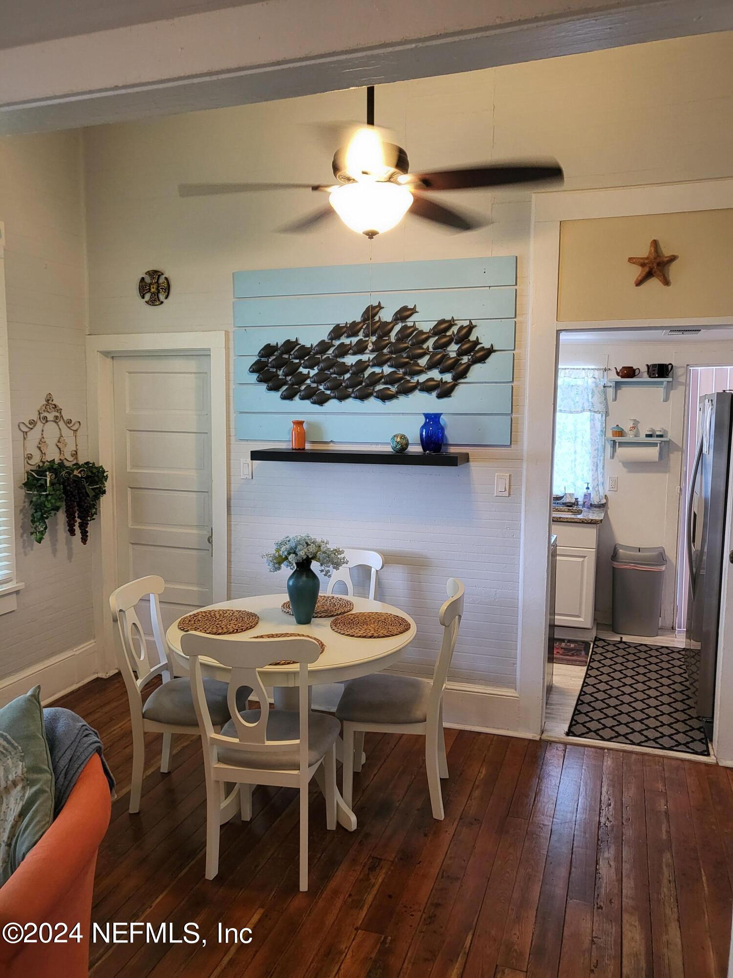 16 Rohde Avenue St. Augustine, FL 32084 - Photo 52 of 114 a dining room with furniture and wooden floor