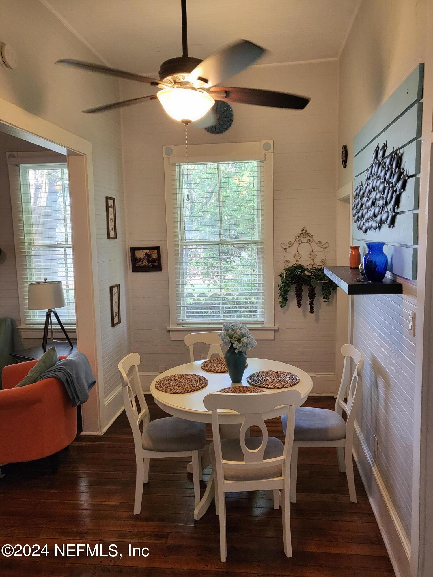 16 Rohde Avenue St. Augustine, FL 32084 - Photo 64 of 114 a dining room with furniture a chandelier and window