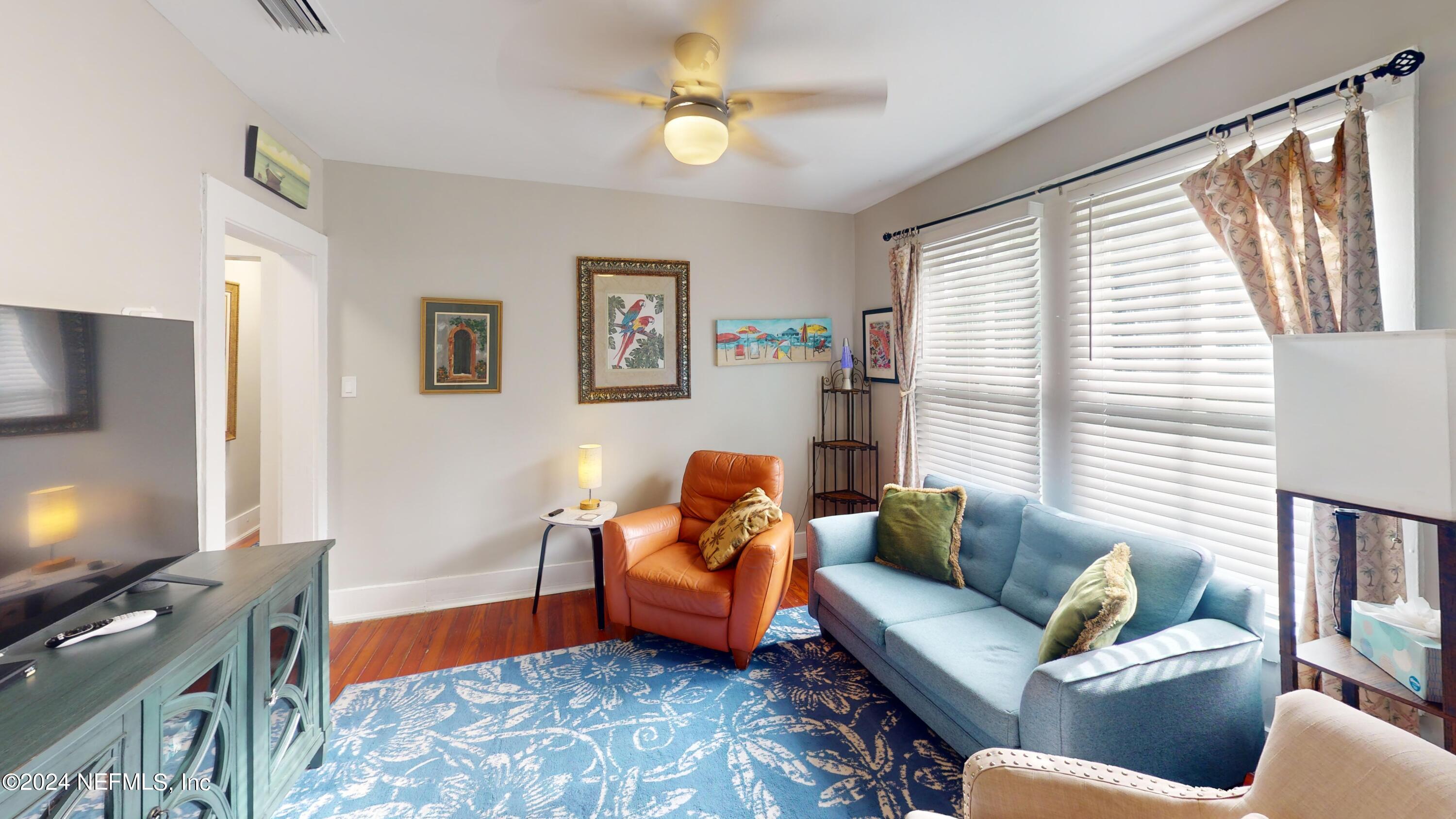 16 Rohde Avenue St. Augustine, FL 32084 - Photo 7 of 114 a living room with furniture and a flat screen tv