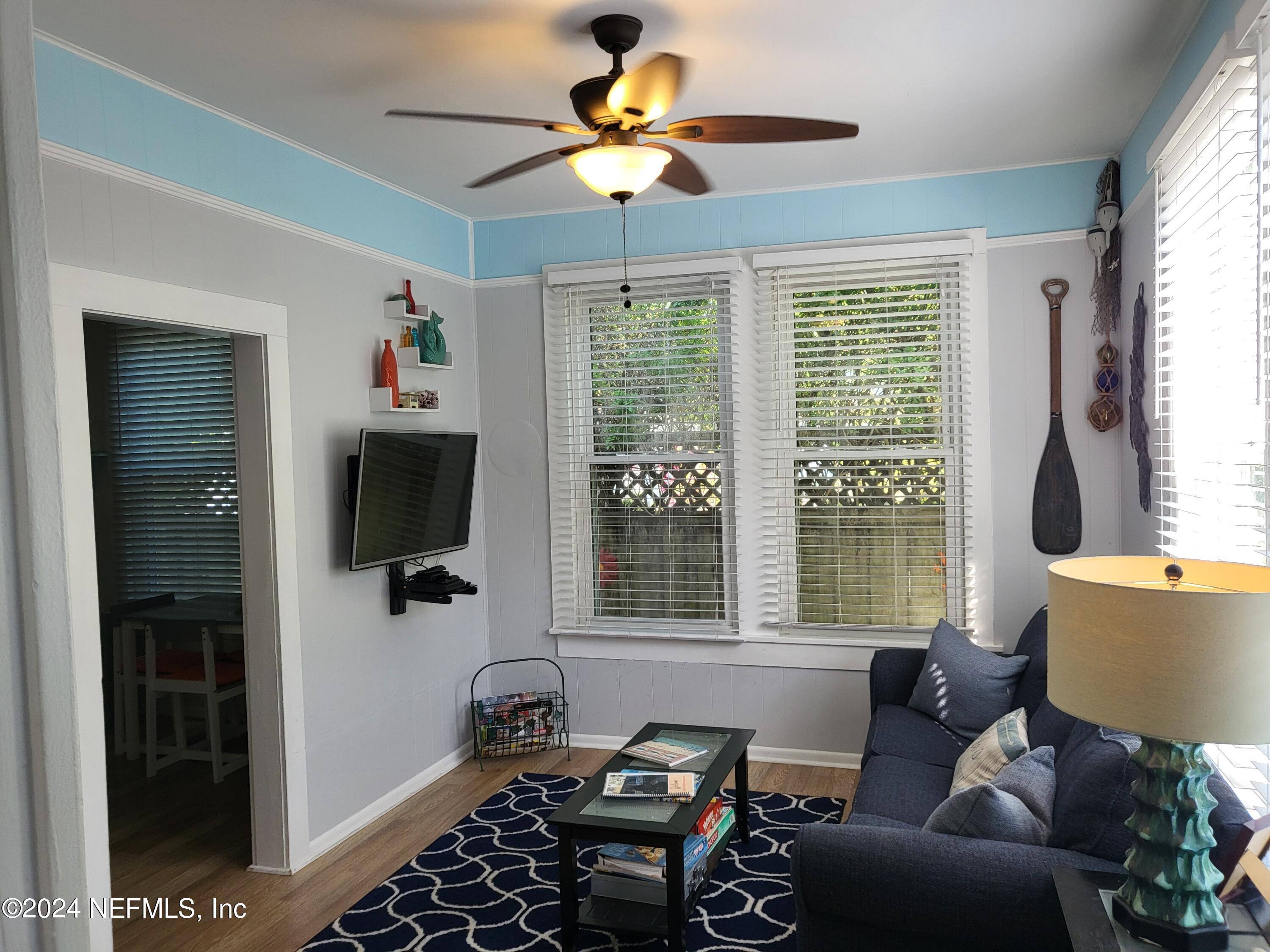 16 Rohde Avenue St. Augustine, FL 32084 - Photo 72 of 114 a living room with furniture and a flat screen tv