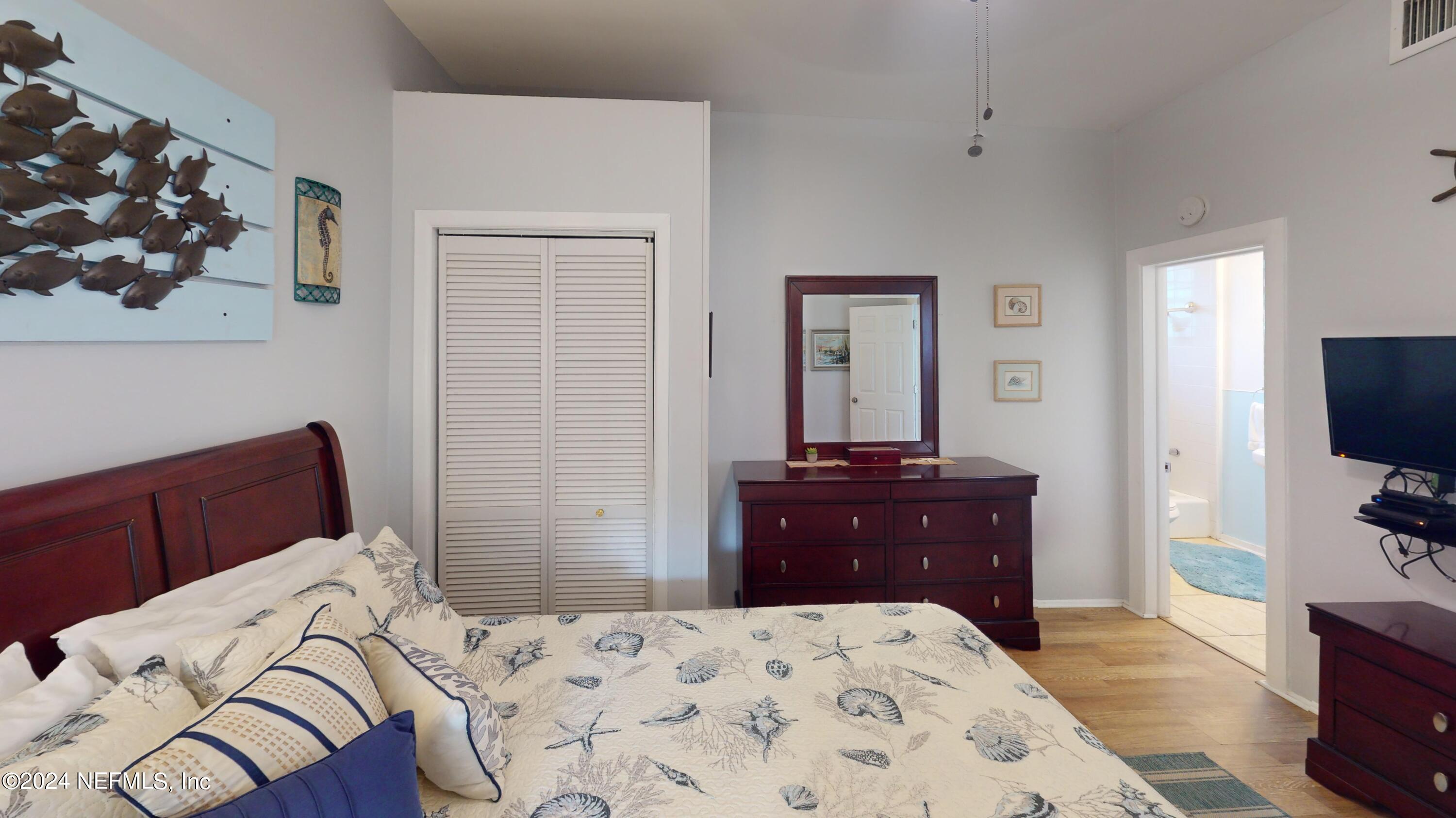 16 Rohde Avenue St. Augustine, FL 32084 - Photo 91 of 114 a bedroom with a bed and a dresser in it