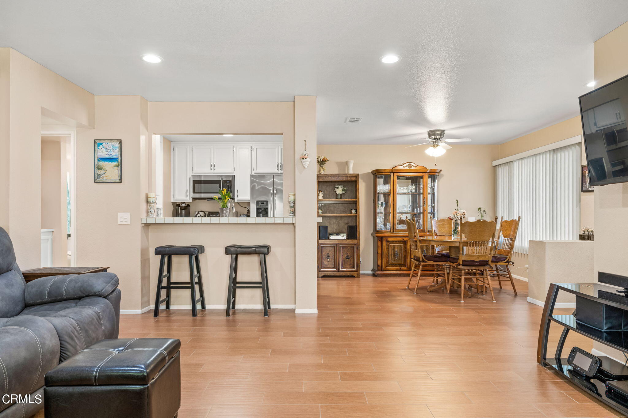 1965 Majorca Drive, Unit 237 Oxnard, CA 93035 - Photo 11 of 50 a living room kitchen with furniture and a table