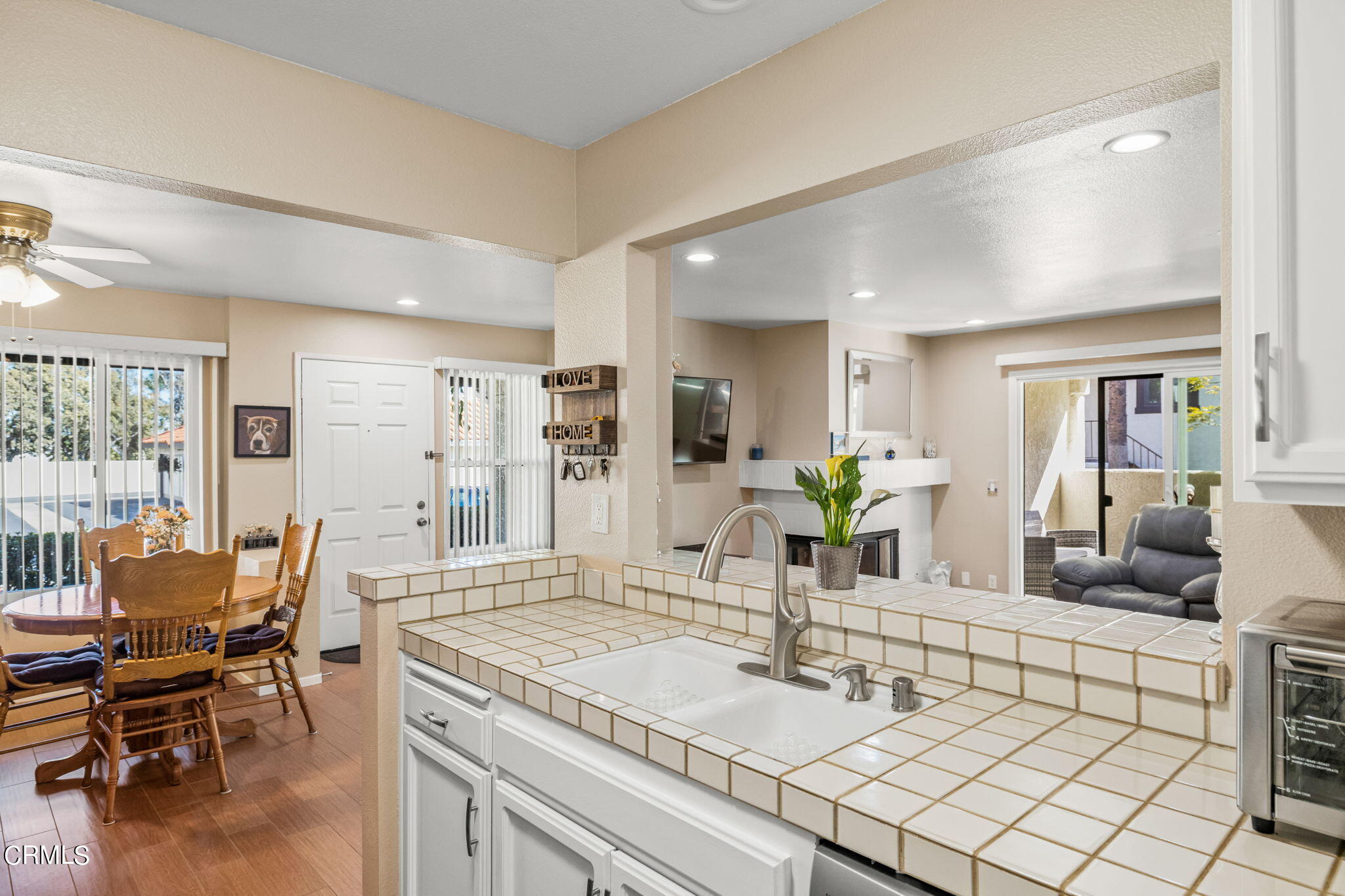 1965 Majorca Drive, Unit 237 Oxnard, CA 93035 - Photo 17 of 50 a living room with furniture and wooden floor