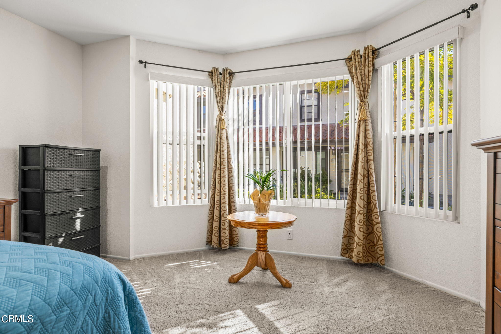 1965 Majorca Drive, Unit 237 Oxnard, CA 93035 - Photo 24 of 50 a bedroom with a bed and a window