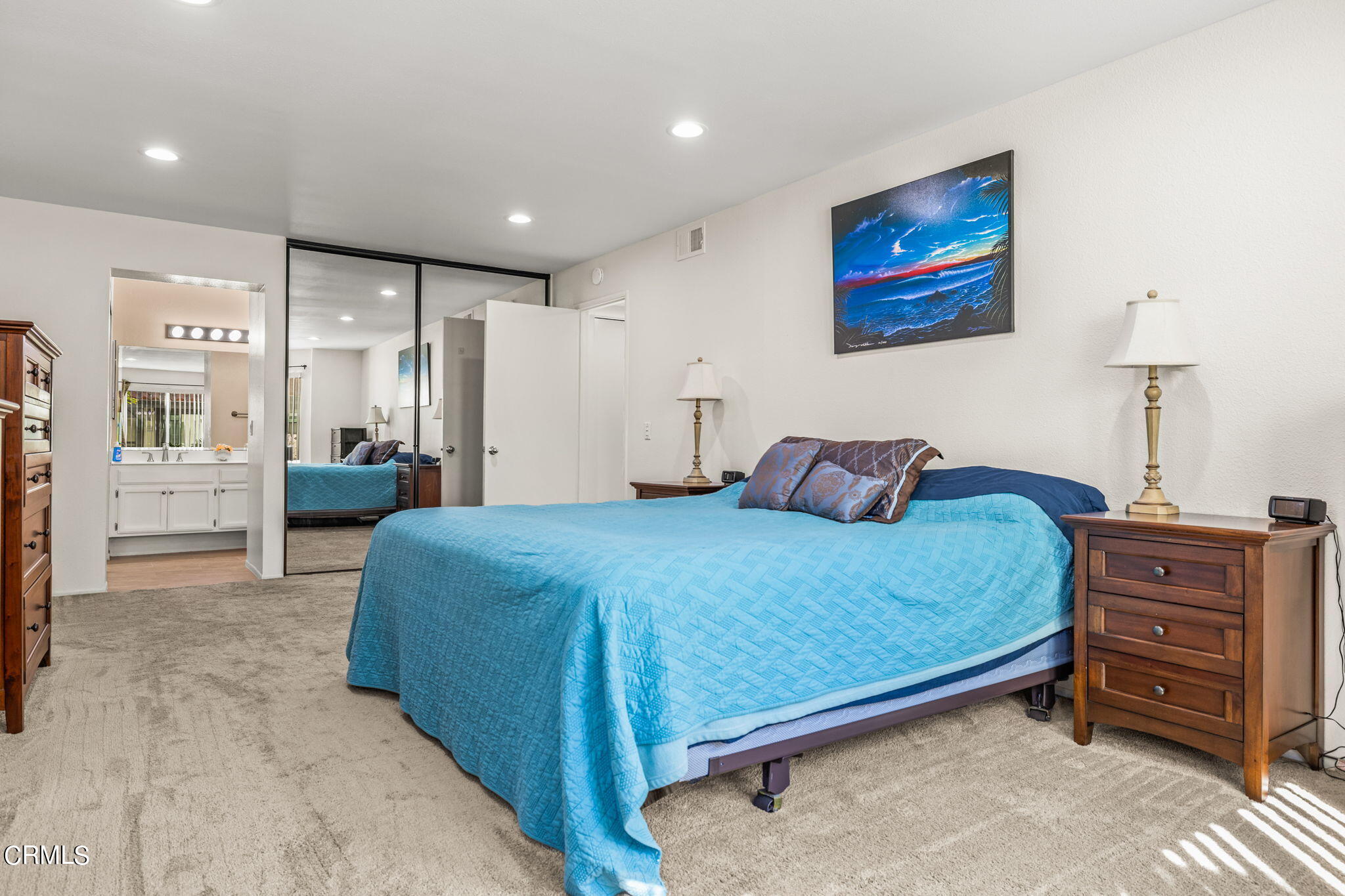 1965 Majorca Drive, Unit 237 Oxnard, CA 93035 - Photo 25 of 50 a spacious bedroom with a bed and a walk in closet