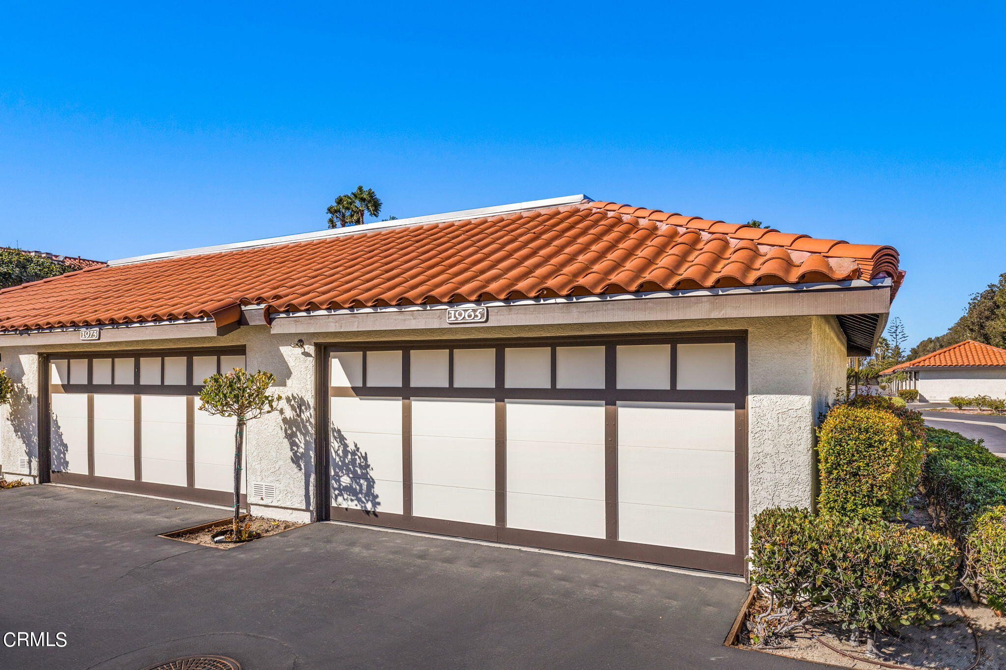 1965 Majorca Drive, Unit 237 Oxnard, CA 93035 - Photo 33 of 50 a view of backyard with a garden and deck