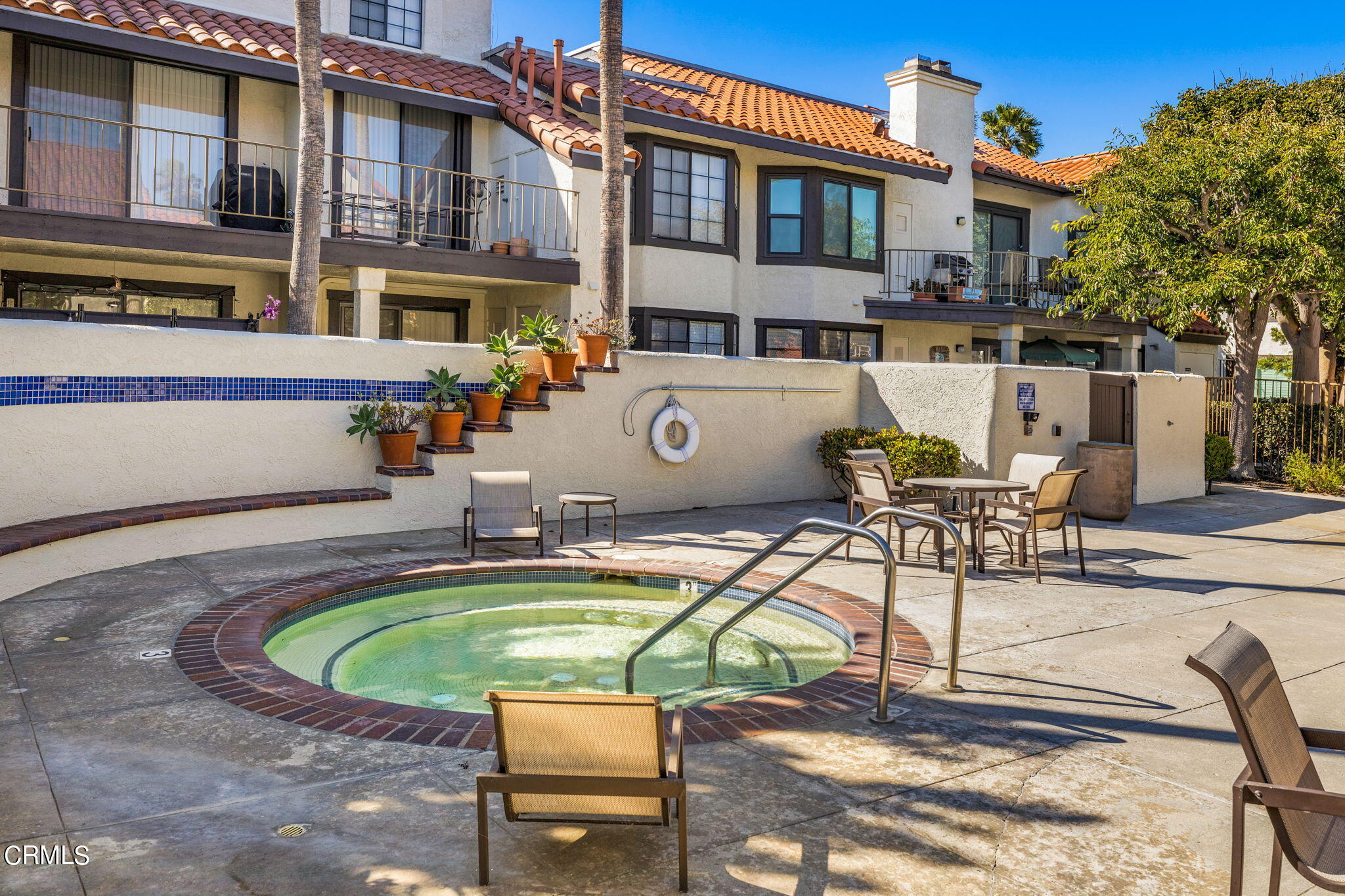 1965 Majorca Drive, Unit 237 Oxnard, CA 93035 - Photo 34 of 50 a view of a house with swimming pool