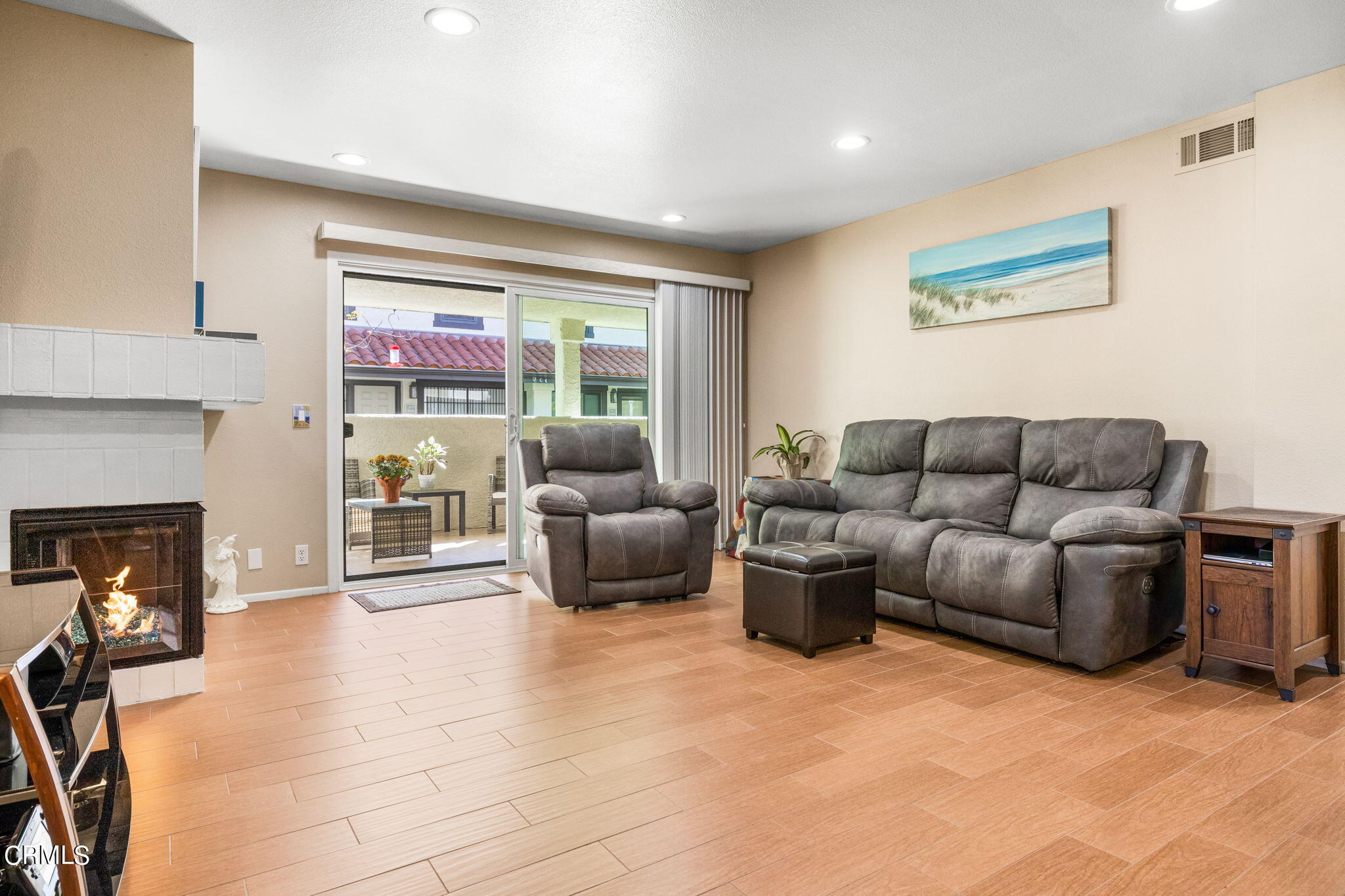 1965 Majorca Drive, Unit 237 Oxnard, CA 93035 - Photo 7 of 50 a living room with furniture and a fireplace