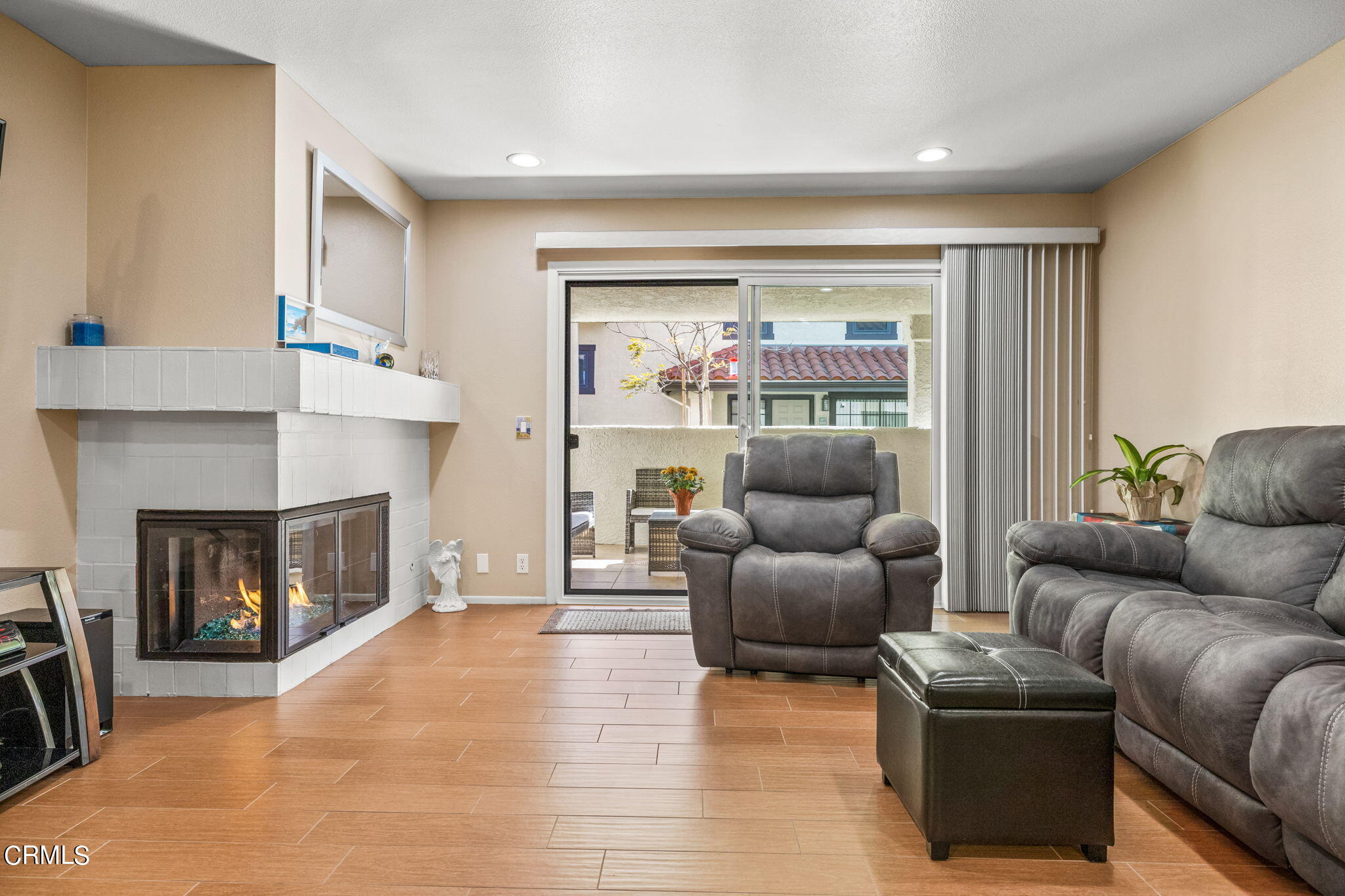 1965 Majorca Drive, Unit 237 Oxnard, CA 93035 - Photo 8 of 50 a living room with furniture and a fireplace