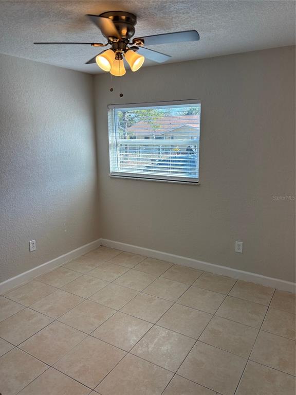 1610 Hinckley Road Orlando, FL 32818 - Photo 9 of 10 a view of an empty room