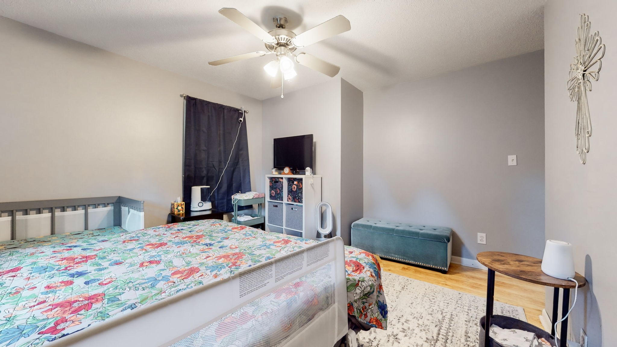 710 Howell Hill Road Flintville, TN 37335 - Photo 16 of 38 a bedroom with a bed and a flat screen tv