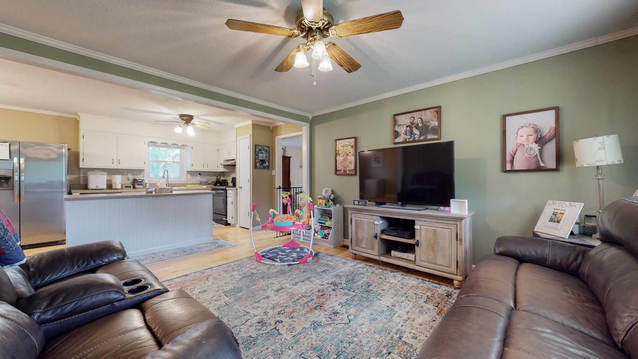 710 Howell Hill Road Flintville, TN 37335 - Photo 6 of 38 a living room with furniture and a flat screen tv