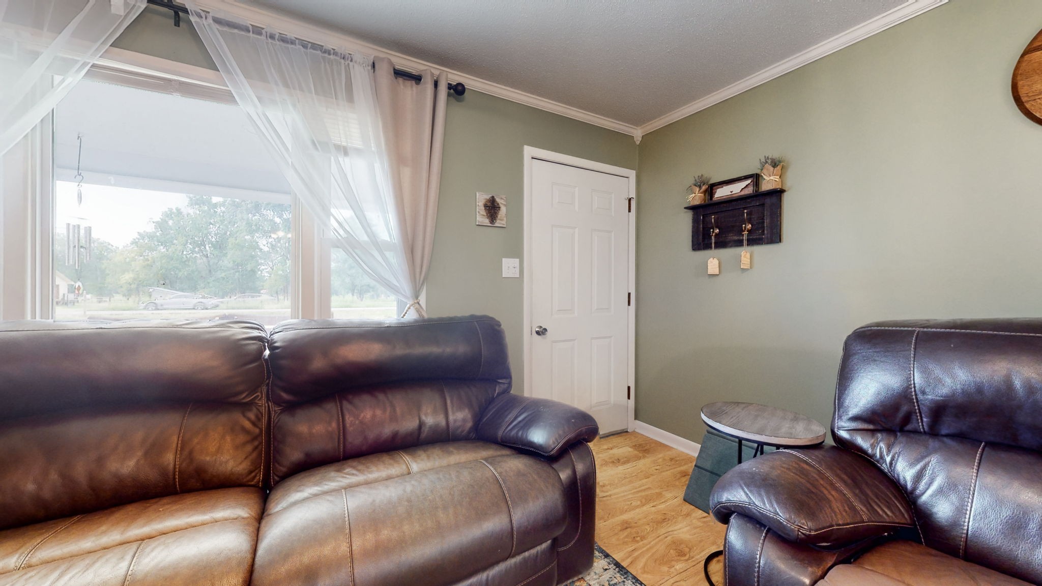 710 Howell Hill Road Flintville, TN 37335 - Photo 8 of 38 a living room with a couch and a window