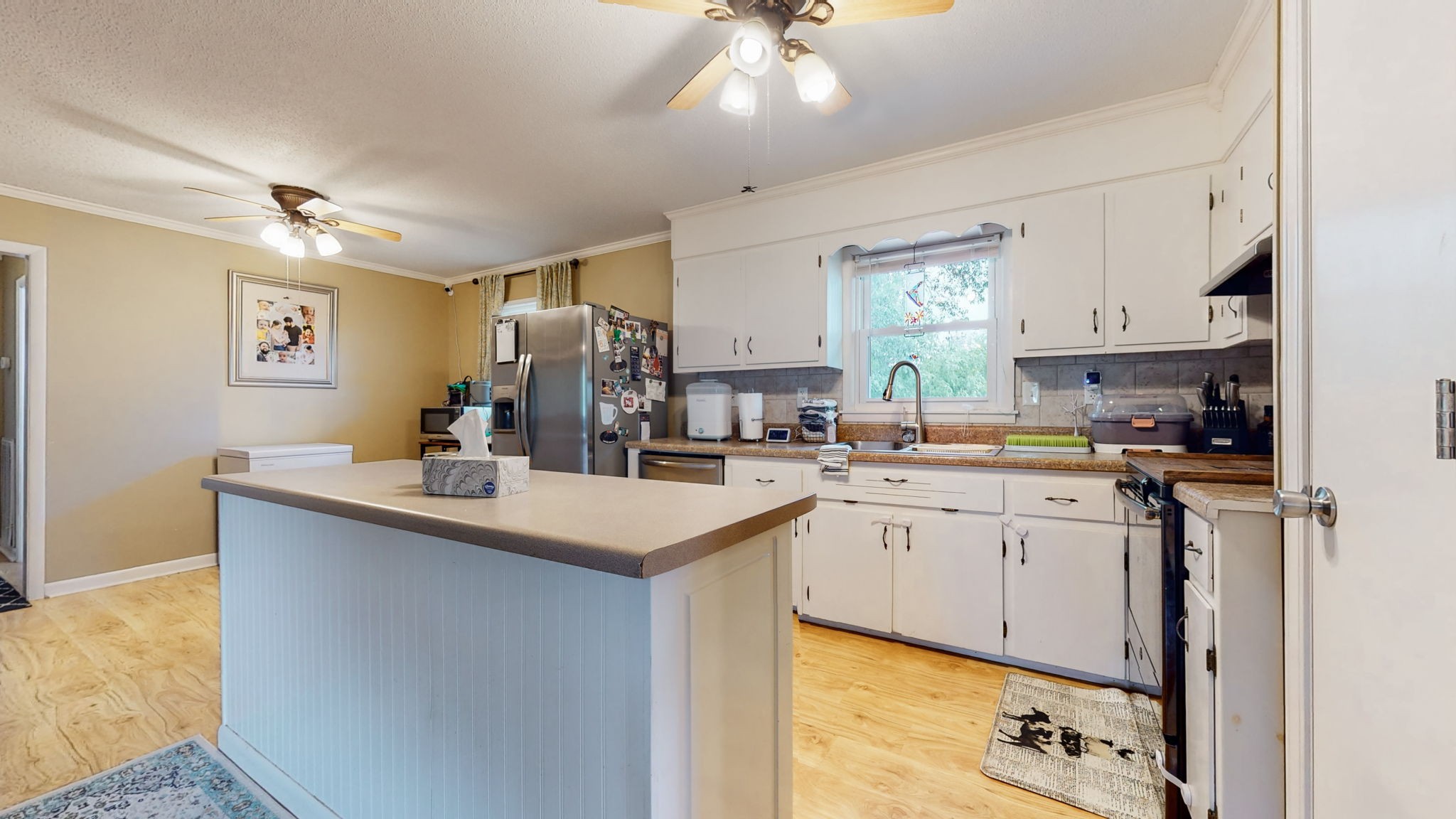 710 Howell Hill Road Flintville, TN 37335 - Photo 10 of 38 a kitchen with sink cabinets and window