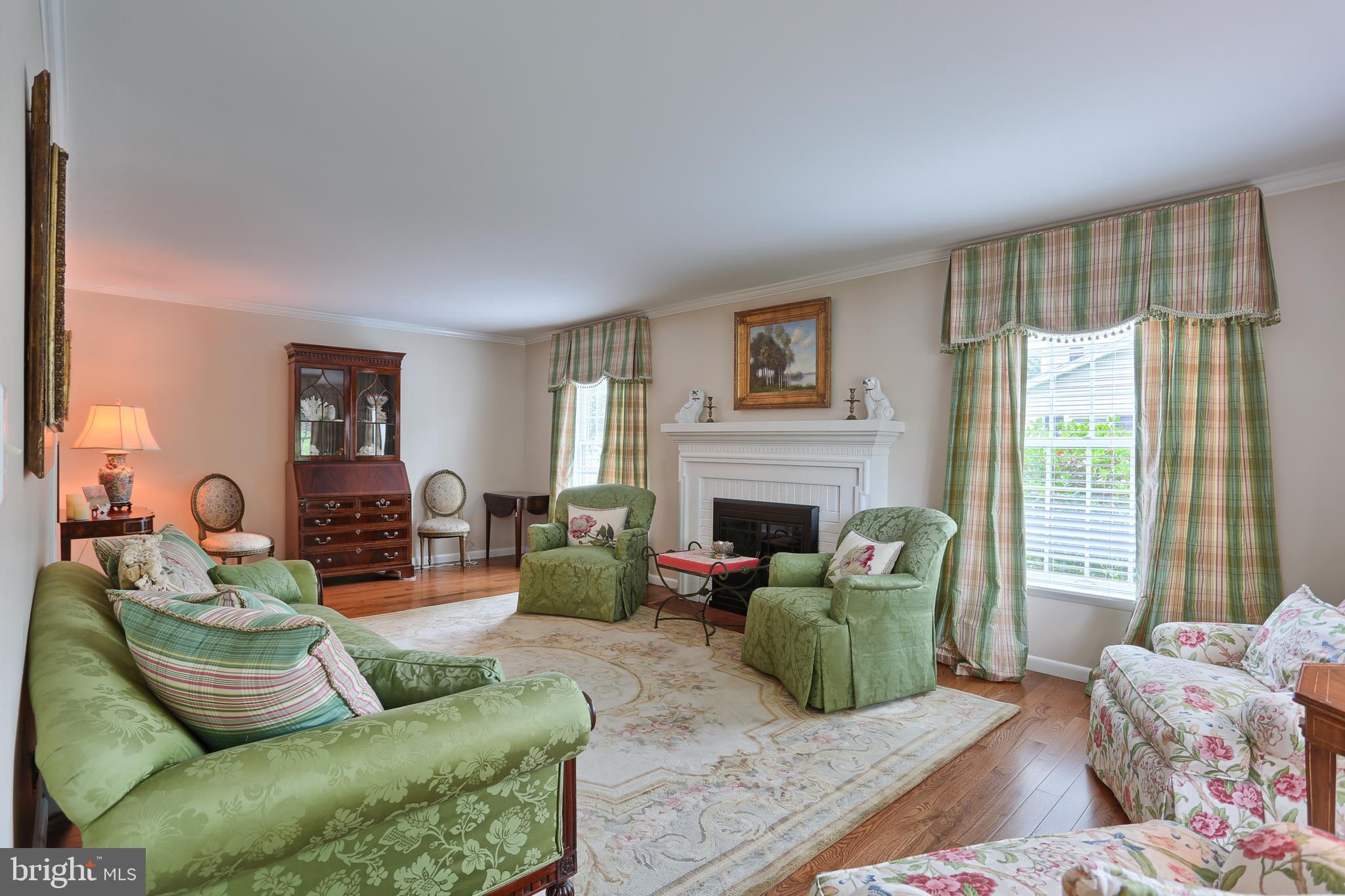 256 Harvey Road Hershey, PA 17033 - Photo 2 of 56 Living room with fireplace, hardwood flooring