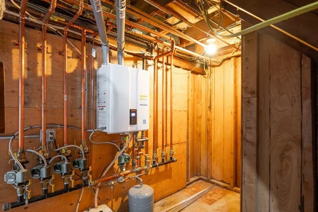 a view of an empty room and hallway