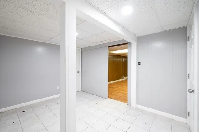 a view of an empty room and window