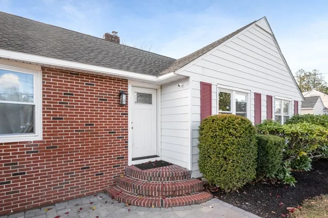 a front view of a house with swimming pool