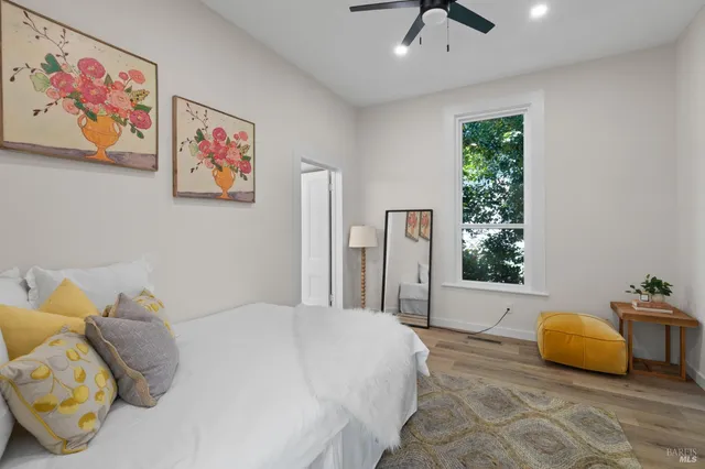 a bathroom with a double vanity sink toilet and shower