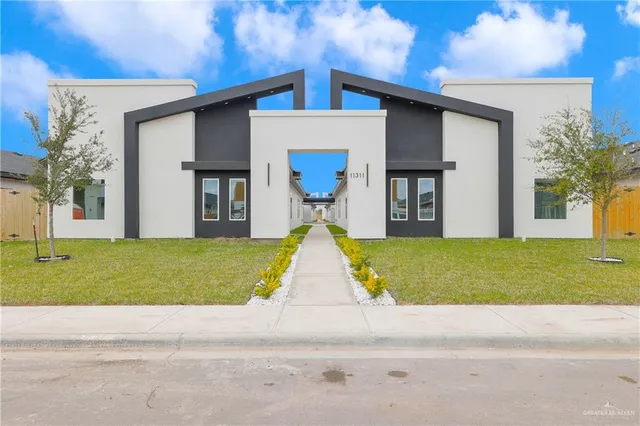 a view of outdoor space yard and front view of a house
