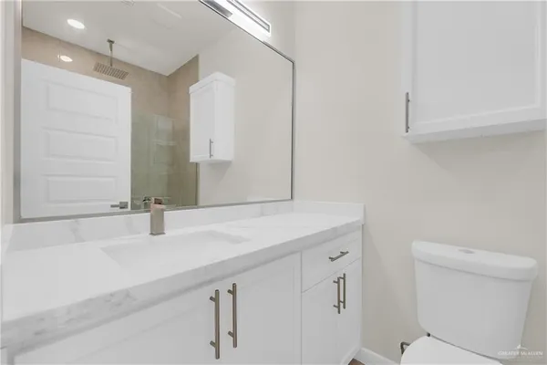 a bathroom with a sink and a toilet