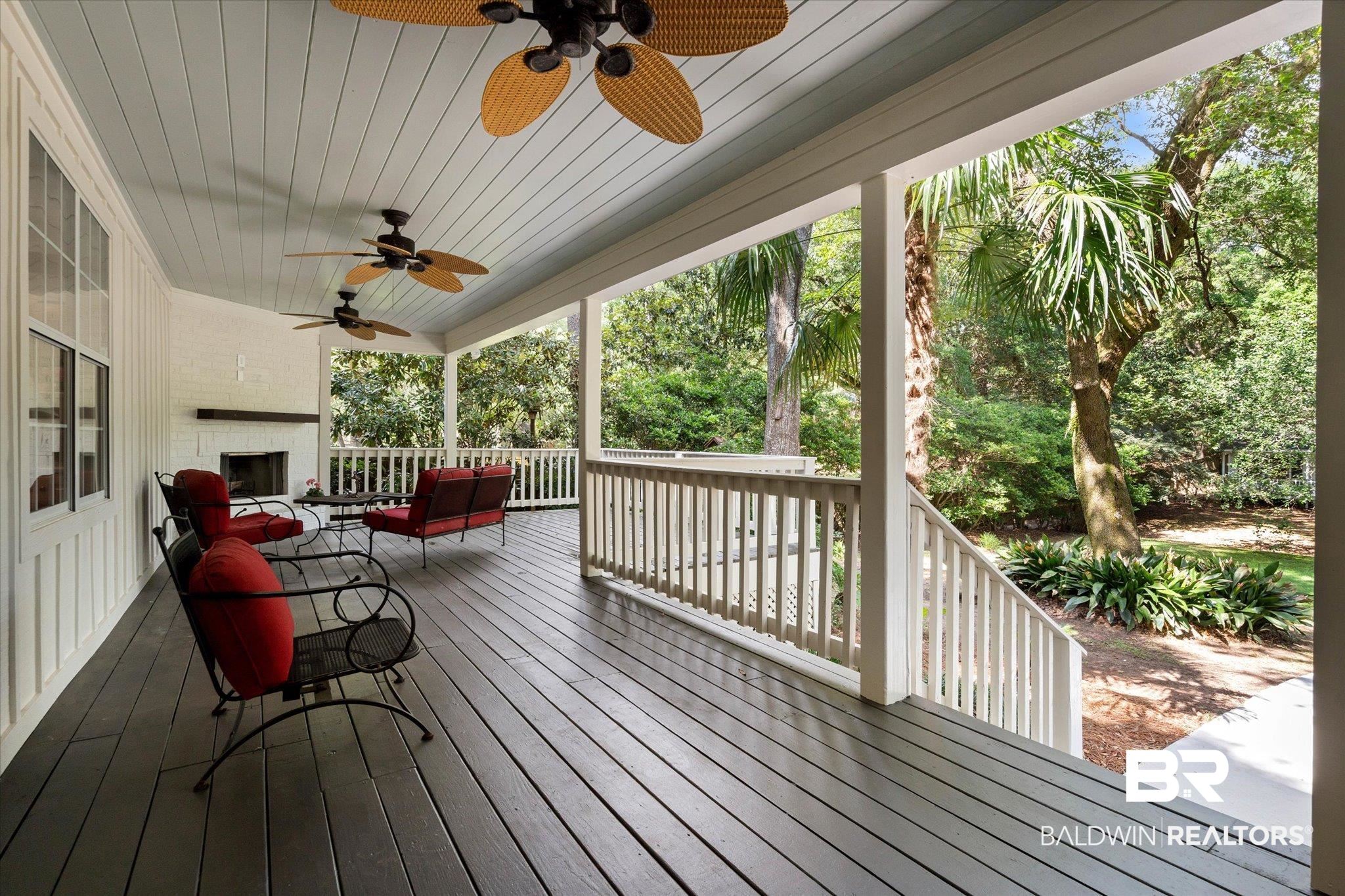 3715 Latigo Road Mobile, AL 36695 - Photo 19 of 39 Wooden deck with ceiling fan and an outdoor hangout area