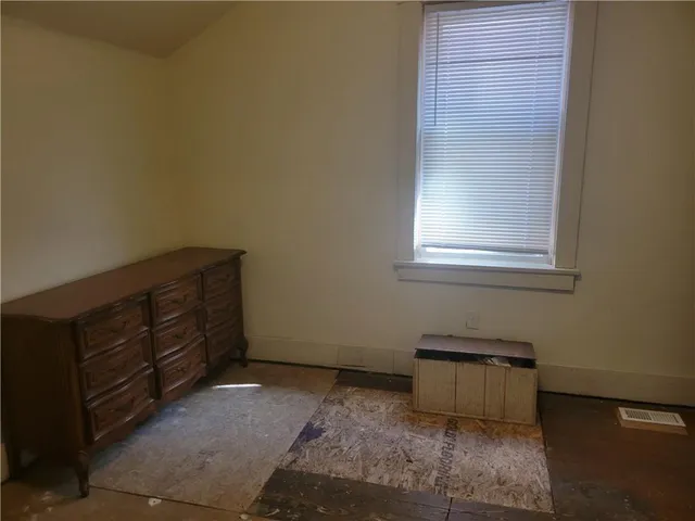 a room with a dresser