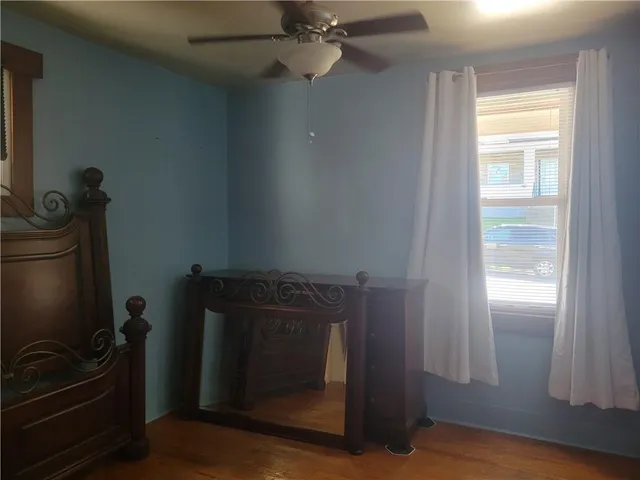 a room with a mirror and a window