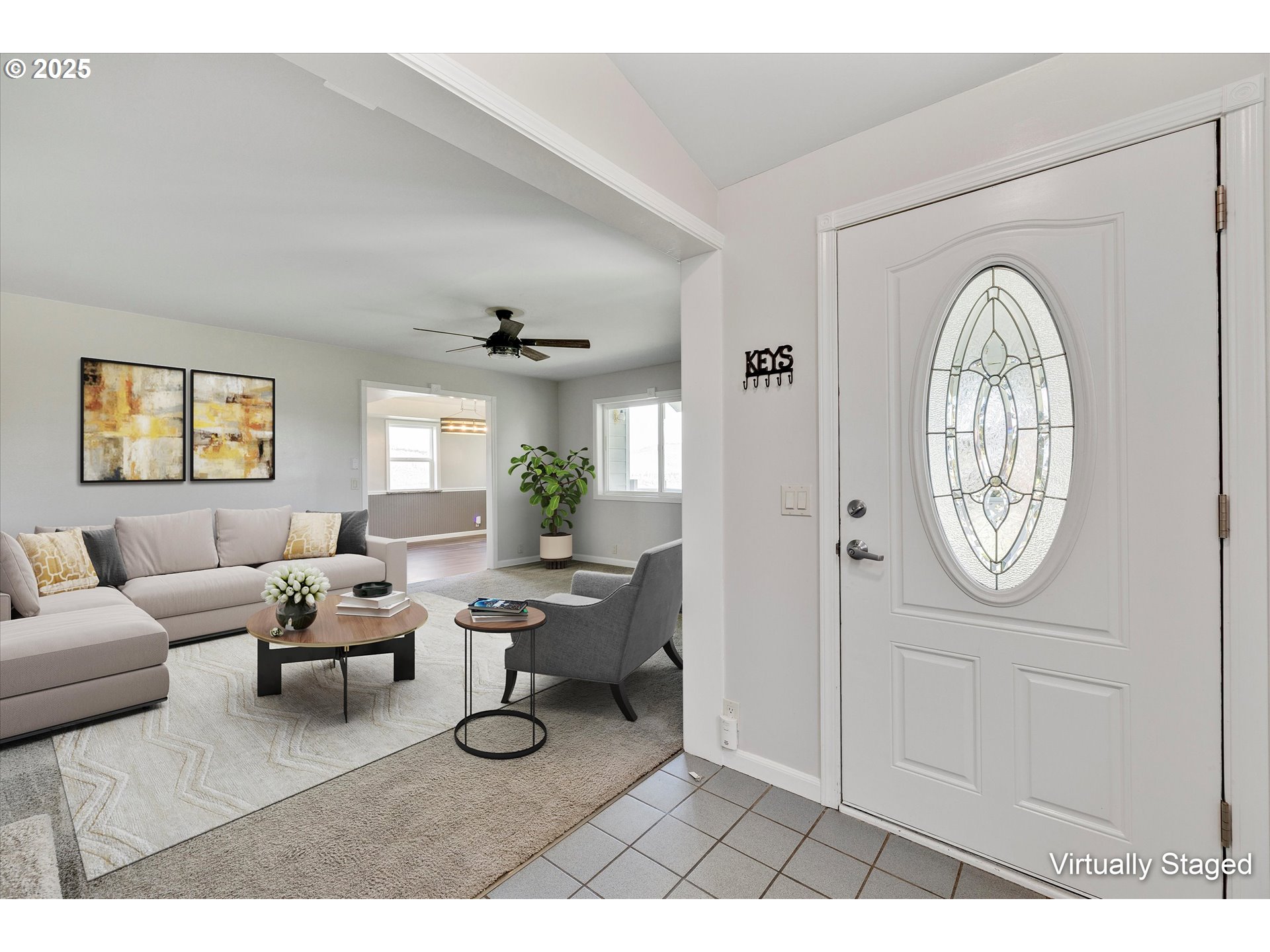 1805 Carroll Road Mosier, OR 97040 - Photo 11 of 45 a living room with furniture a clock and white walls