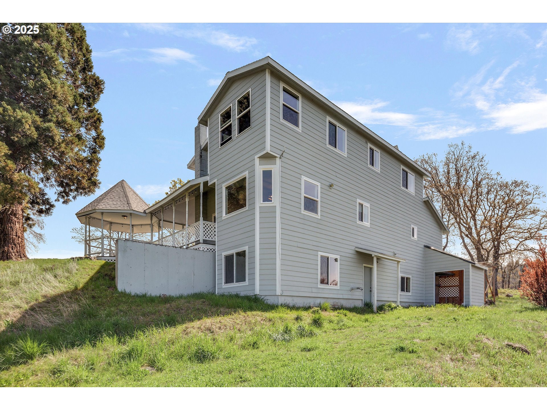1805 Carroll Road Mosier, OR 97040 - Photo 35 of 45 a front view of a house with a yard