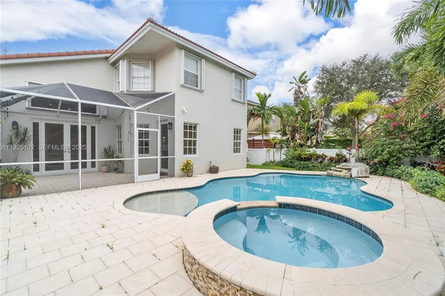 a view of outdoor space yard swimming pool and furniture