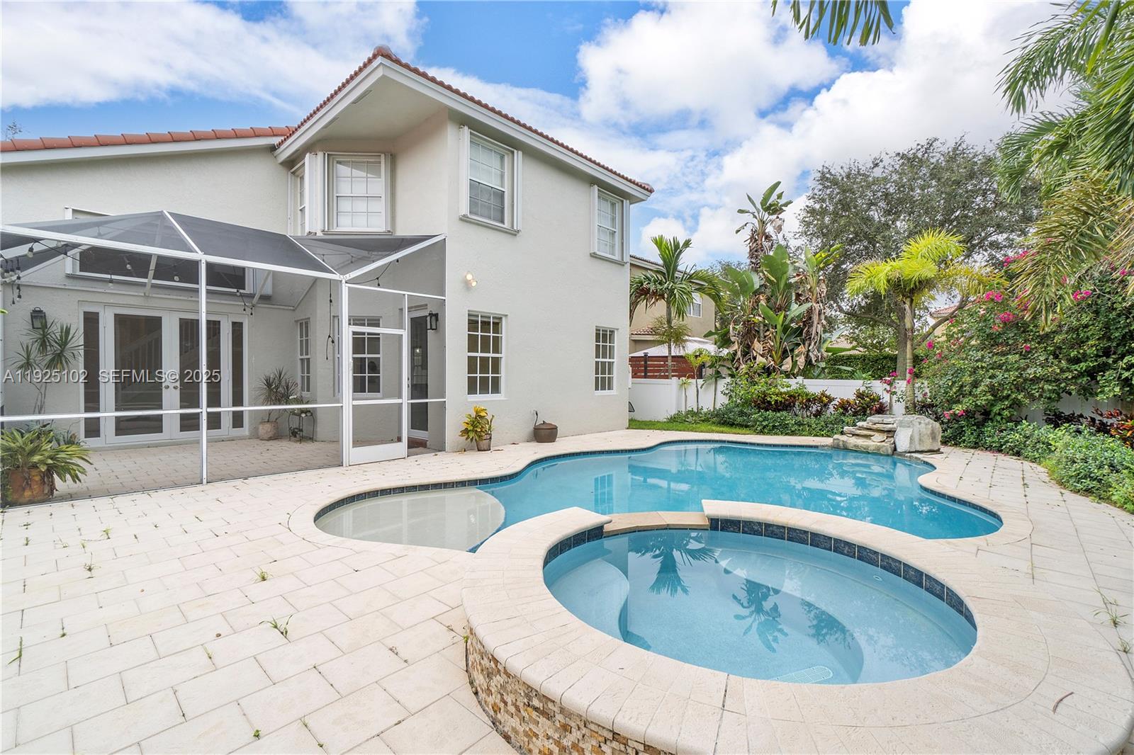 5310 Northwest 124th Way Coral Springs, FL 33076 - Photo 21 of 30 a view of outdoor space yard swimming pool and furniture