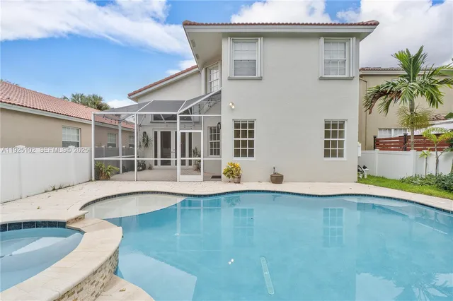 a view of pool with outdoor seating