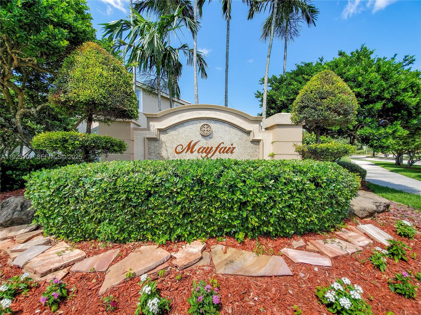 5310 Northwest 124th Way Coral Springs, FL 33076 - Photo 30 of 30 a front view of a house with a yard and potted plants