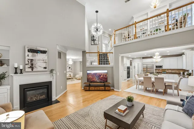 a view of a livingroom with furniture and a window