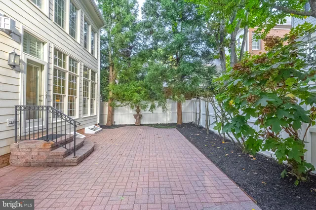 a view of a building with sitting area