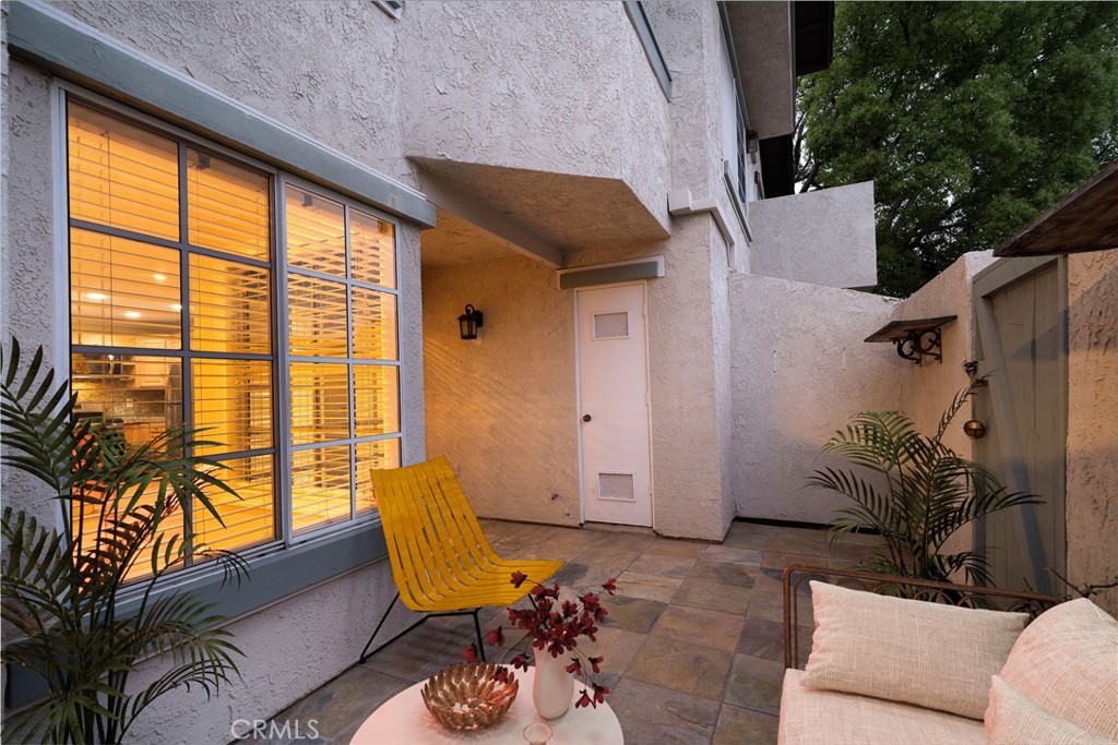 155 Oxford, Unit 37 Irvine, CA 92612 - Photo 13 of 33 a view of patio with couple of couch and chairs