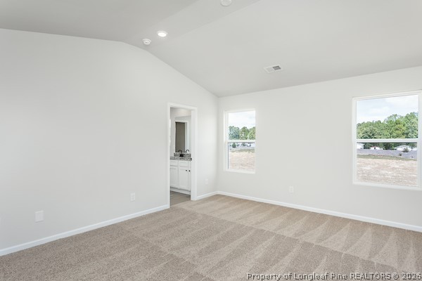 28 Rider Street Broadway, NC 27505 - Photo 16 of 22 an empty room with windows and closet