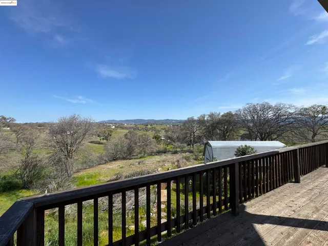 a view of a balcony with outdoor space