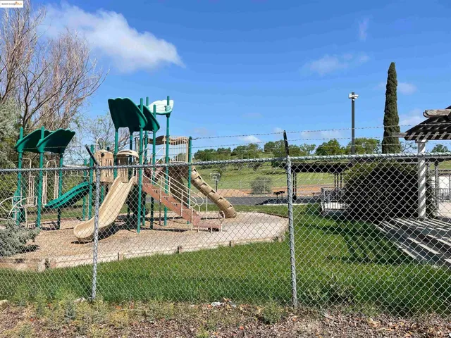 a view of a park with slide