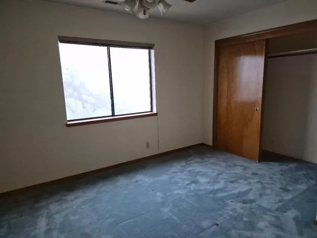 an empty room with a window