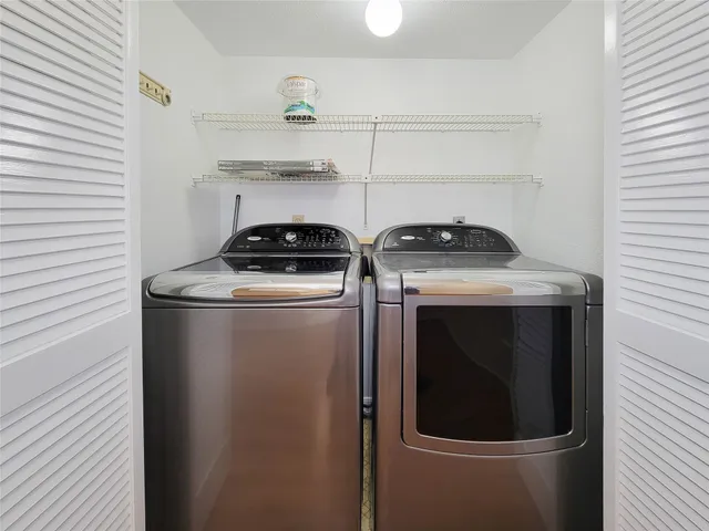 a stove top oven sitting inside of a kitchen