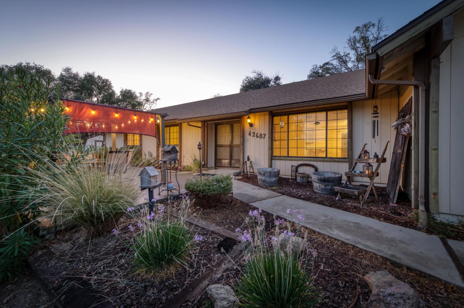 42607 Long Hollow Drive Coarsegold, CA 93614 - Photo 13 of 52 a view of a house with a patio